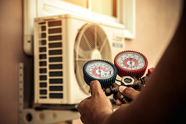 Professional Ac Installation technician working in Calera, AL